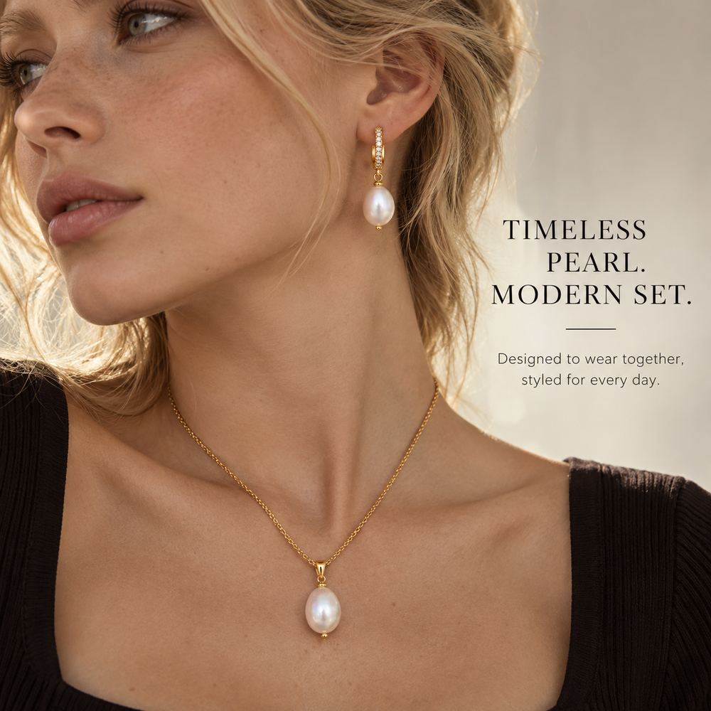 Model wearing Pearl Drop Set freshwater pearl necklace and huggie earrings