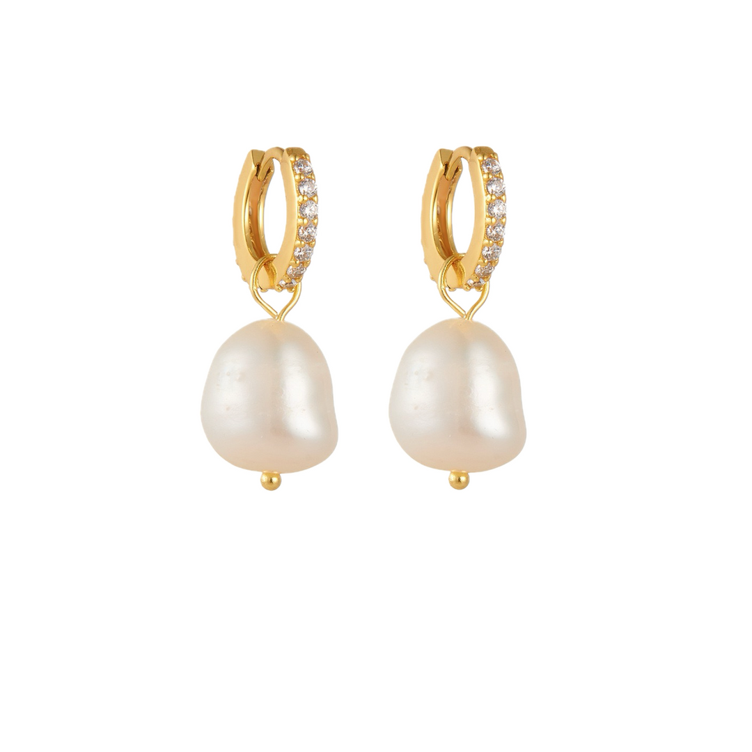 Gold hoop earrings with dangling freshwater pearl.
