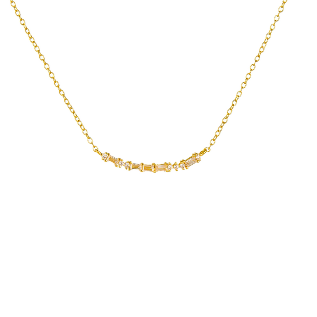 Minimalist silver curved bar necklace with pearls.